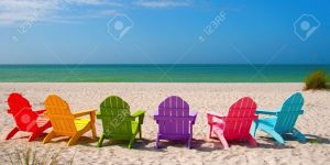 rainbow chairs on the beach