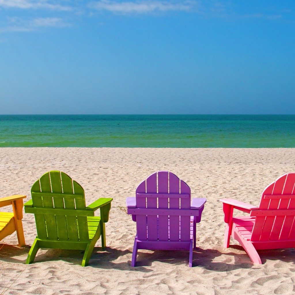 rainbow chairs on the beach